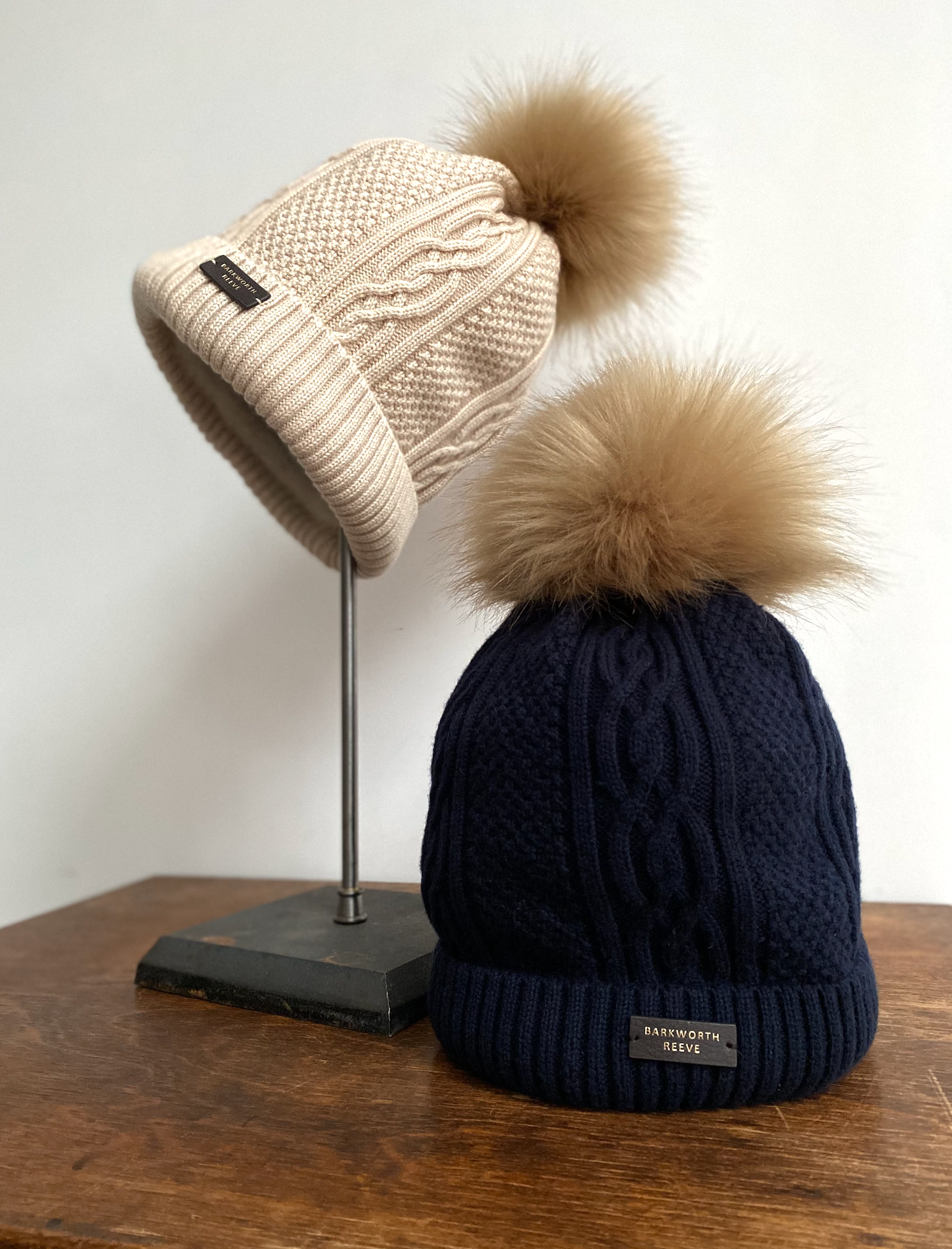 Navy blue store knitted bobble hat