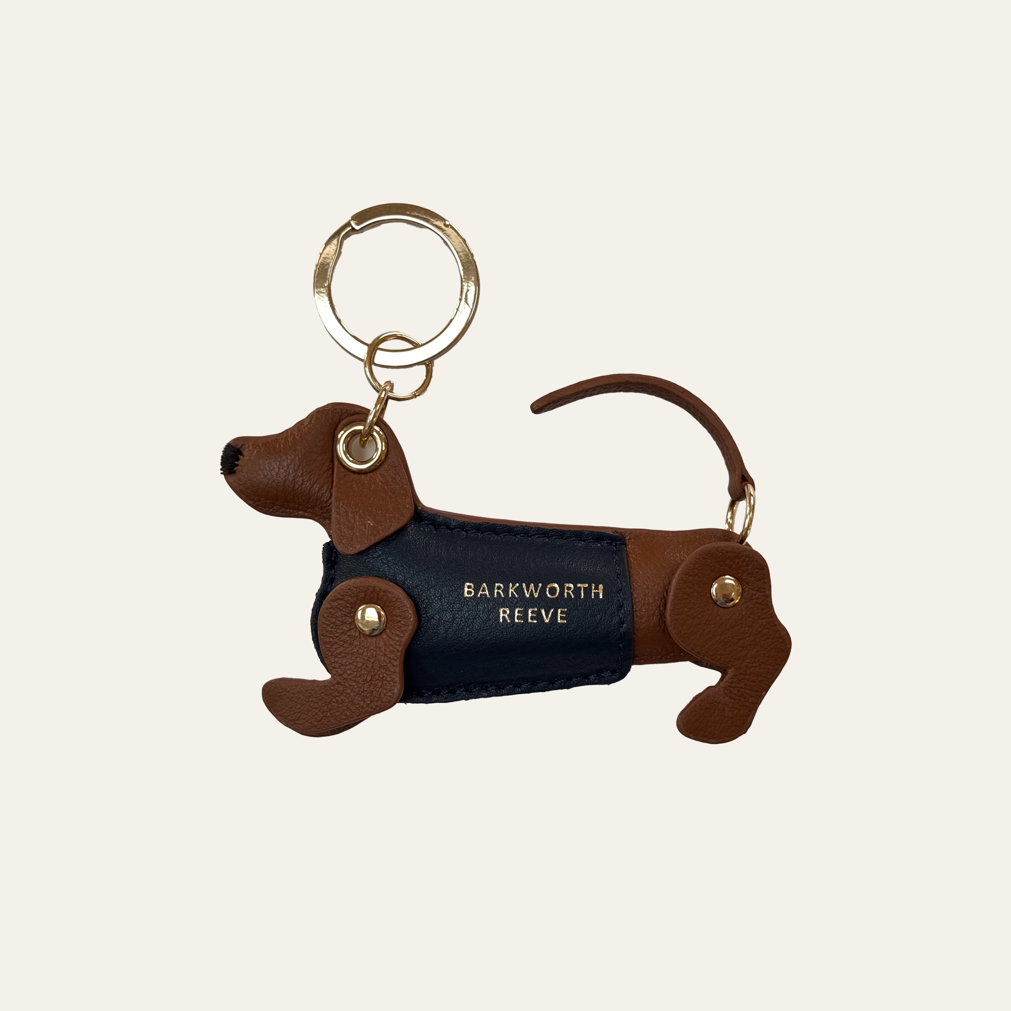 tan leather dachshund keyring, with blue leather coat and gold keyring split ring